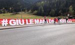 #GiùemanidalMorelli, la protesta al Giro d'Italia
